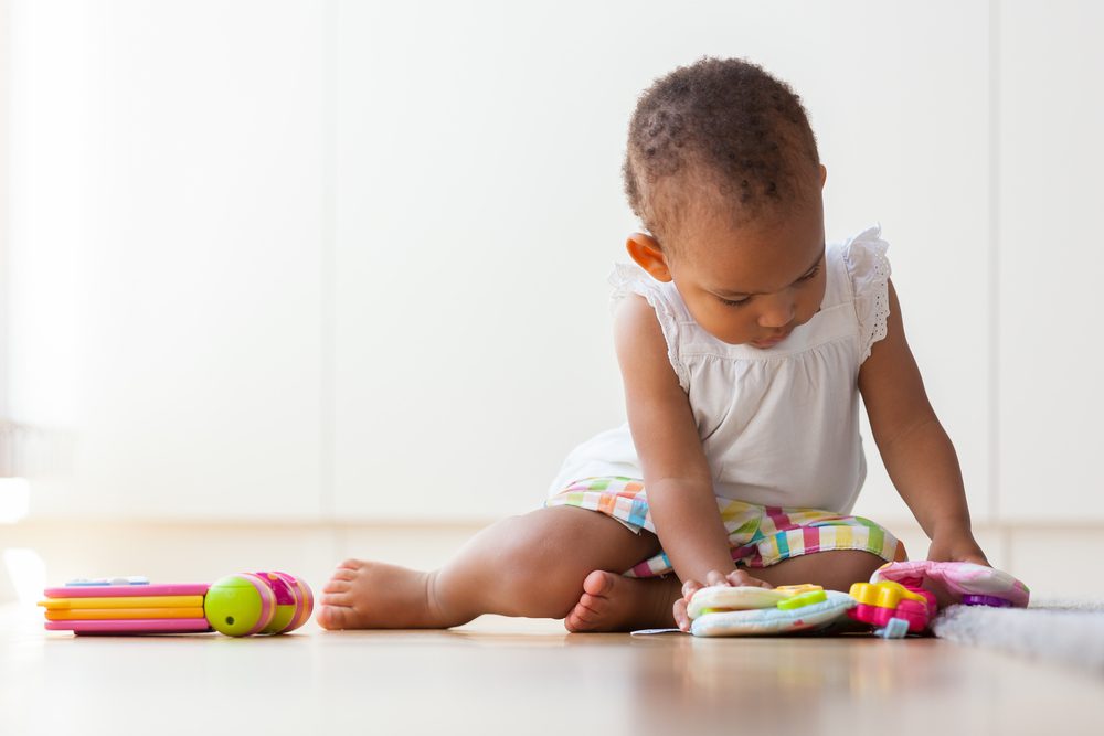 Portrait,Of,Little,African,American,Little,Girl,Sitting,On,The